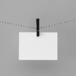 Simple paper note on a clothesline